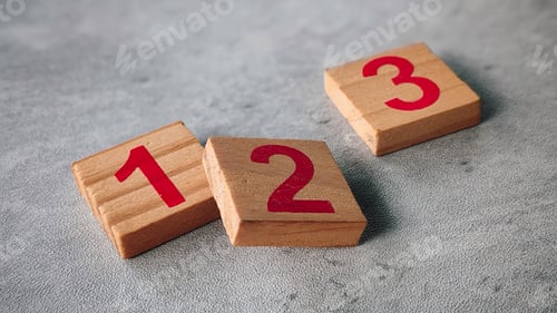 Preview: Wooden Number Blocks 1, 2, 3 Arranged on Gray Surface