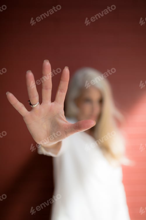 Preview: Woman showing hand palm
