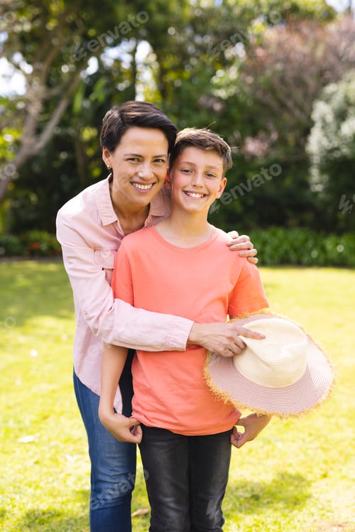 Preview: Caucasian mother and son spending time together in the garden