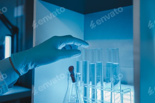 Preview: a scientist is working in a laboratory, a chemical researcher is preparing sample for a vaccine agai