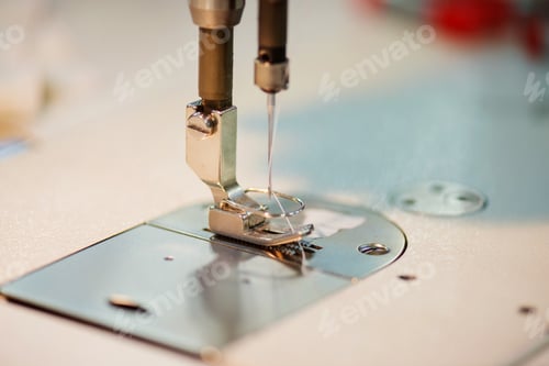 Preview: Close up of old sewing machine needle