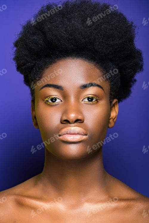 Preview: beautiful african american young woman with yellow eyelashes on purple