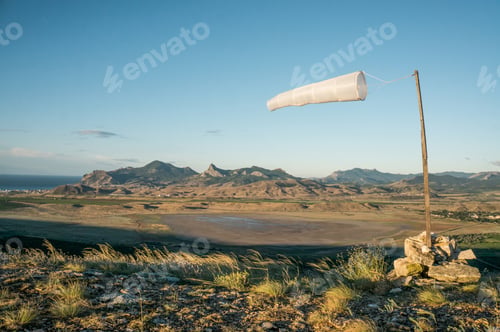 Preview: meteorology wild sign at lake in mountains
