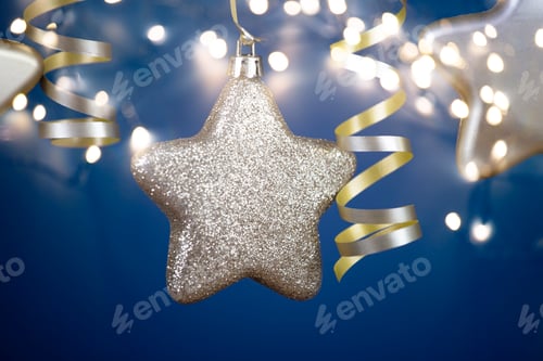 Preview: Christmas golden star ornaments in holiday night