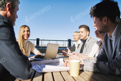 Preview: meeting of a group of entrepreneurs in a brainstorming session for a start-up company.