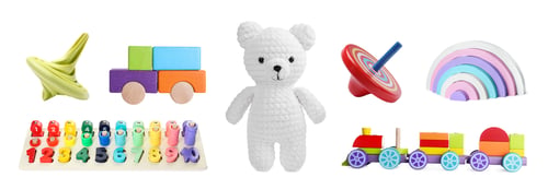 Preview: Cute teddy bear and other toys isolated on white