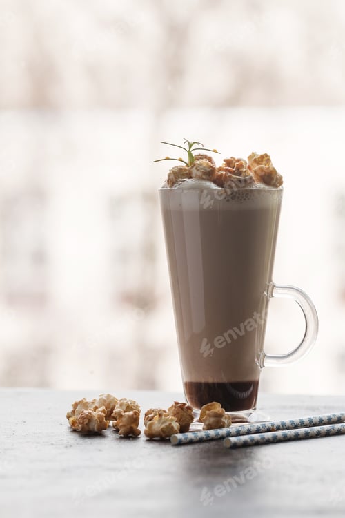 Preview: Glass of coffee with popcorn