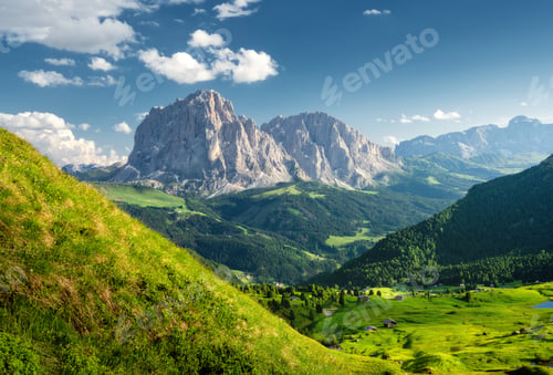 Preview: Aerial view of alpine mountain valley at sunset in summer
