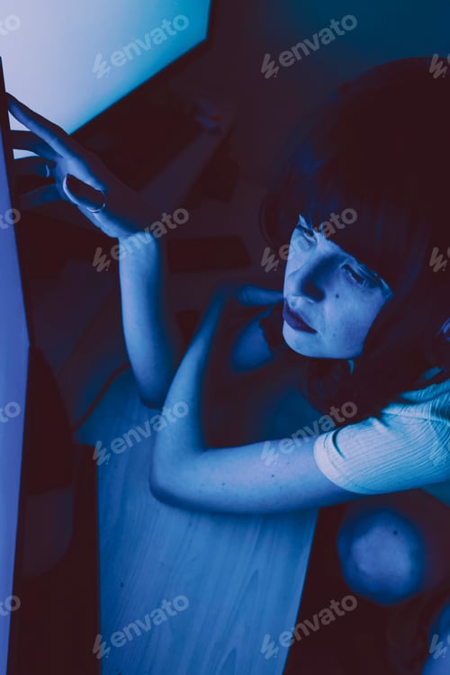 Preview: Young streamer woman working at night from home
