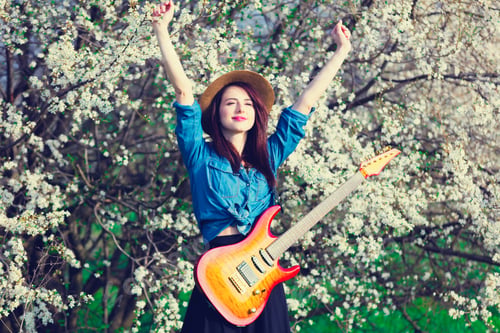 Preview: portrait of young woman with guitar