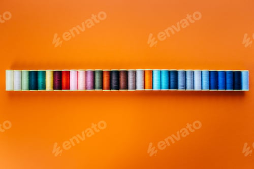 Preview: Colored thread for sewing. Threads in spools tape measure