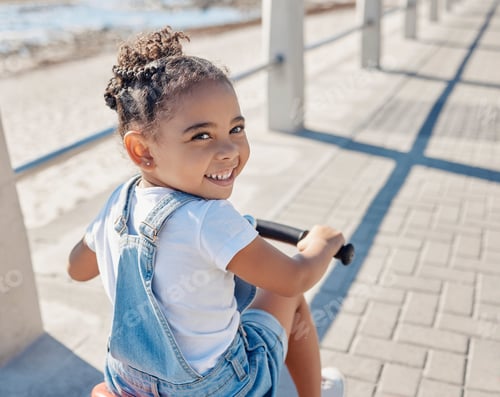 Preview: Bike, girl and smile for beach, holiday and outdoor to relax, summer and waterfront. Portrait, cycl