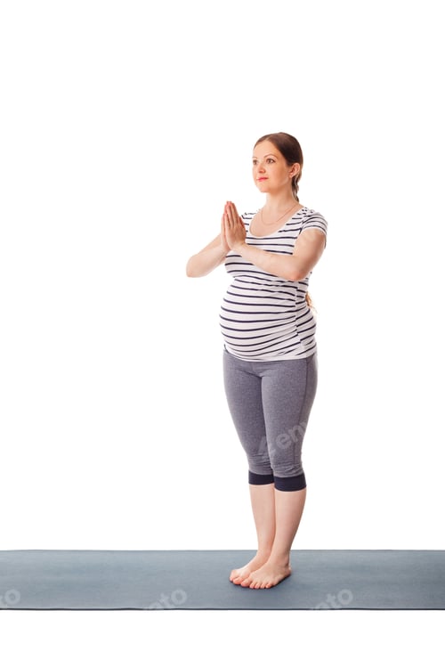 Preview: Pregnant woman doing yoga asana