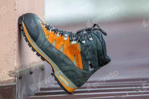 Preview: A leather trekking hiking winter boot on blurred background