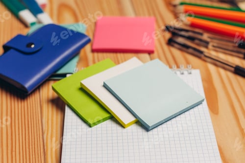Preview: multicolored pencils stationery paper office wooden table