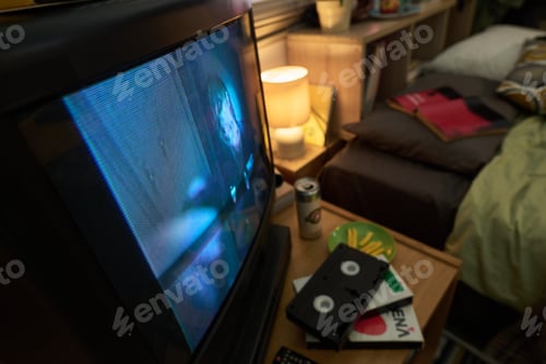 Preview: Watching Horror Film in Cozy Bedroom Setting