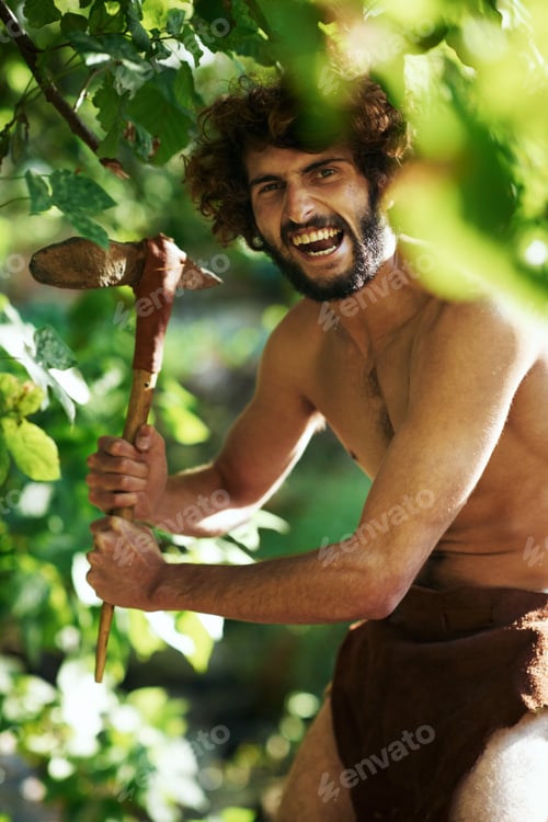 Preview: Time for hunting. An aggressive caveman holding an axe.