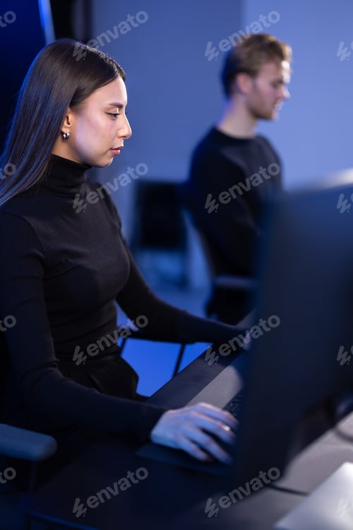 Preview: Busy and focused teamwork investigation in cyber security working to prevent security threats