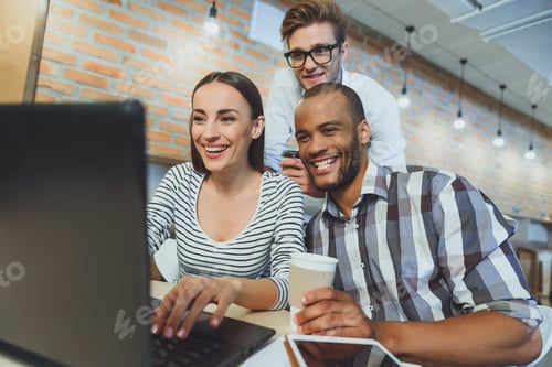 Preview: Joyful Woman And Men Relaxing In Internet Cafe