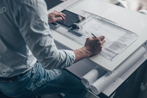 Preview: Young architect in the workplace