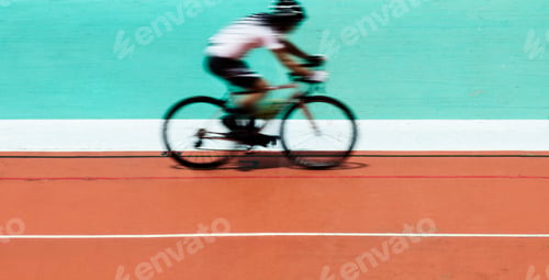 Preview: Cyclist biking at a stadium
