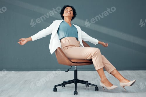 Preview: Chair, fun and carefree with a business black woman sliding on the floor of her office feeling stre