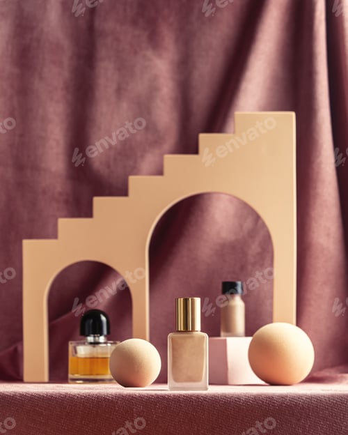 Preview: presentation of nail polish and other cosmetics next to golden geometric shapes