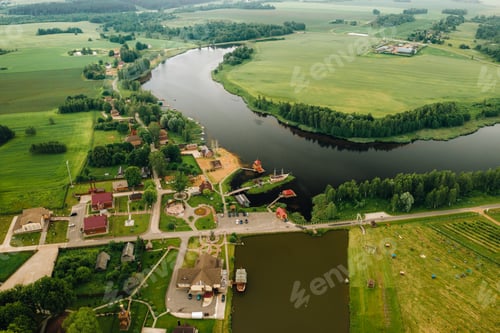 Preview: view from the height of the Lake in a green field in the form of a horseshoe and a village in the