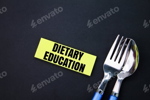 Preview: spoon, fork and paper colored with the word dietary education.
