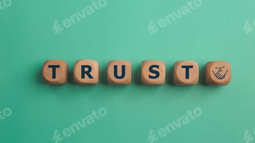 Preview: Wooden blocks with the word Trust. Trust relationships between business partners,