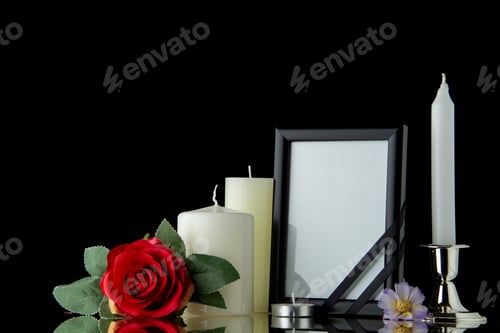 Preview: front view of white candles with picture frame on black background death palestine war