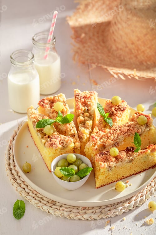 Preview: Sweet gooseberry butter cake served with milk in bottle.