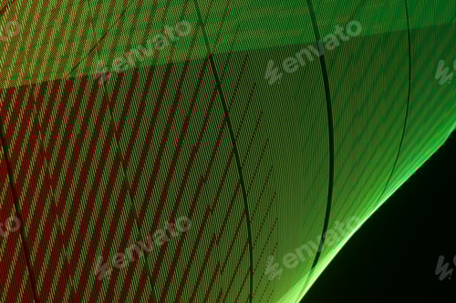Preview: Large display featuring a pattern of green lights radiating outward along distinct lines