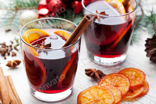 Preview: Mulled Red Wine with Spices, Orange Slices. New Year and Christmas Background.