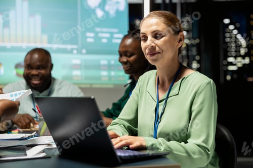 Preview: General manager in a night meeting analyzes global market data