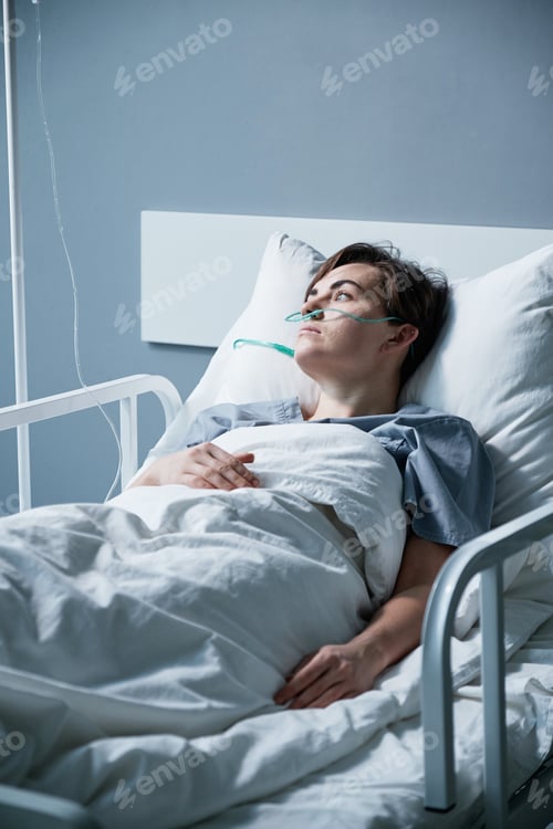 Preview: Woman lying at hospital ward