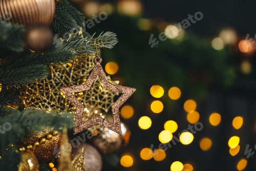 Preview: Beautiful Christmas tree with golden balls decor close up