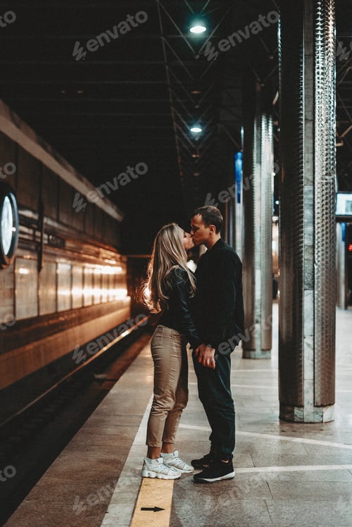 Preview: Kiss of two loving people on a subway station