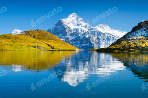 Preview: Bachalpsee, Grindelwald, Switzerland. High mountains and reflection on the surface of the lake.