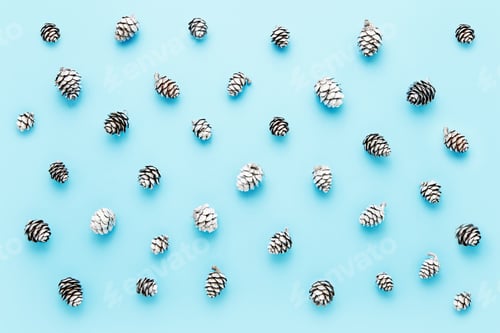 Preview: Abstract background. Small silver cones on a blue background. Top view