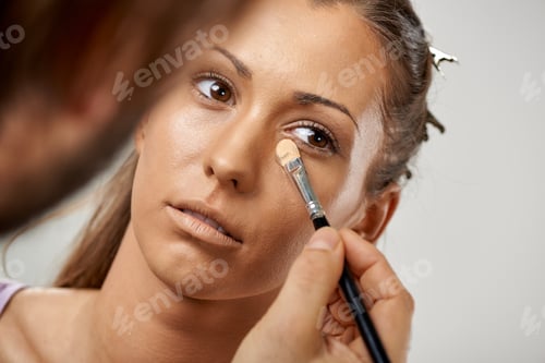 Preview: Professional Makeup Artist Applying Concealer