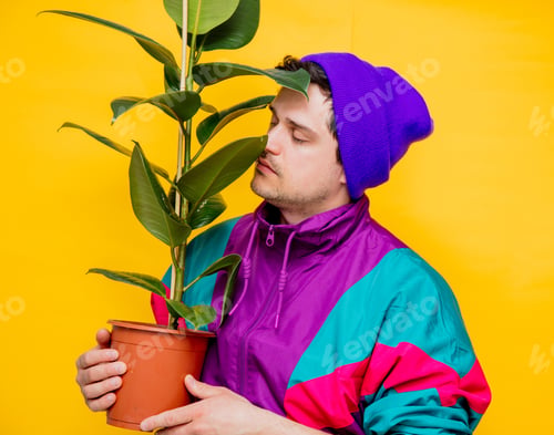 Preview: Funny style white man in 90s jacket and hat with ficus plant