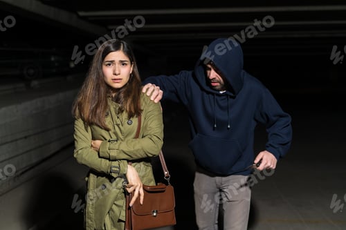 Preview: Portrait Of Frightened Woman Being Followed By Bandit