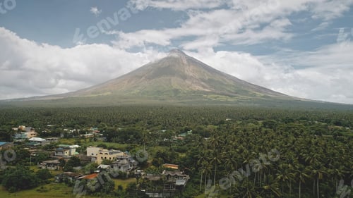 Preview: Tropic countryside with palm trees aerial. Mayon volcano hillside valley. Rural cityscape cottages