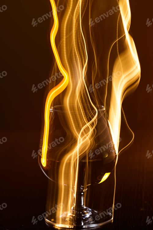 Preview: Golden glass of whiskey and yellow lines