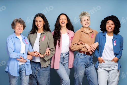 Preview: Happy diverse women wearing pink ribbons are fighting breast cancer together