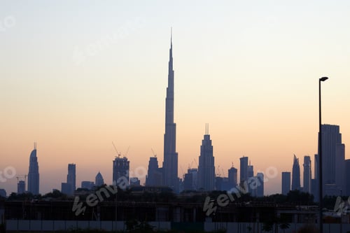 Preview: Dubai skyline with Burj Khalifa skyscraper at sunset, clear sky in United Arab Emirates