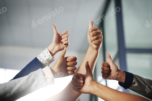 Preview: Cropped shot of a group of unrecognisable businesspeople showing thumbs up