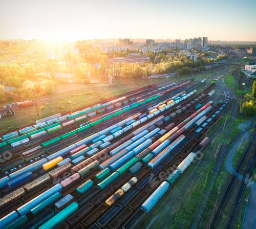 Preview: Aerial view of colorful freight trains on railroad