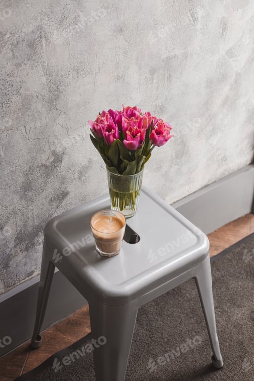 Preview: Flower latte art on white table minimalist lifestyle